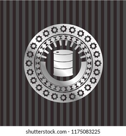 barrel icon inside silvery emblem or badge