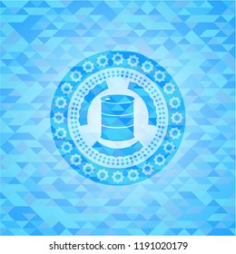 barrel icon inside sky blue emblem with triangle mosaic background