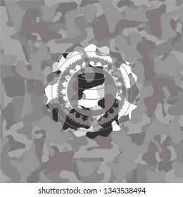 barrel icon on grey camouflage texture