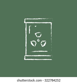 Barrel with ionizing radiation sign hand drawn in chalk on a blackboard vector white icon isolated on a green background.