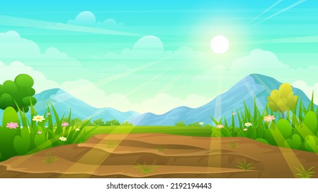 Barren land on top of a hill surrounded by green grass, trees and mountain under the blue sky
