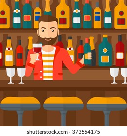 Bartender standing at the bar counter.