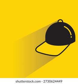 Icono de gorra de béisbol con sombra sobre fondo amarillo