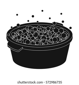 Basin with soap suds and water icon in black style isolated on white background. Cleaning symbol stock vector illustration.