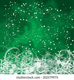 basis under the winter holiday green background with different snowflakes