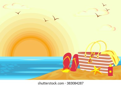 Basket with accessories beach facing a sunset