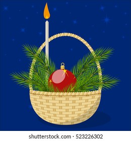 Basket with Christmas ball and candle