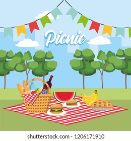 basket with healthy fruits in the tablecloth and party flags