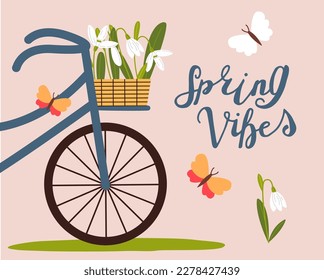 Basket with snowdrops on a bicycle. First spring flowers. Spring mood greeting card template.