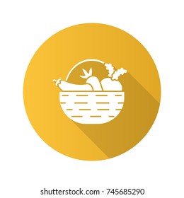 Basket with vegetables flat design long shadow glyph icon. Autumn harvest. Carrot, eggplant, beetroot. Vector silhouette illustration