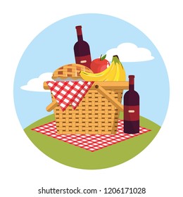 basket with wines bottle and fruits in the tablecloth