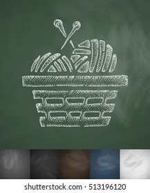 basket with yarn icon. Hand drawn vector illustration