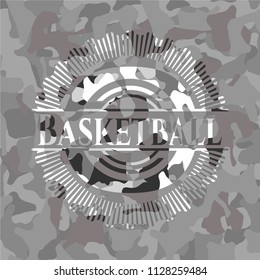 Basketball on grey camo texture