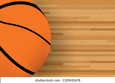 A basketball on a wood gym floor viewed from above