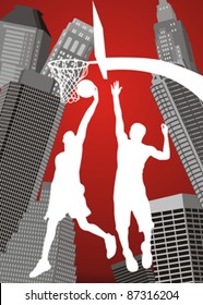 basketball players silhouettes on city background
