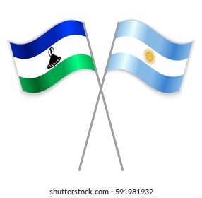 Basotho and Argentine crossed flags. Lesotho combined with Argentina isolated on white. Language learning, international business or travel concept.