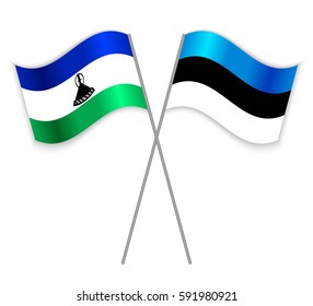 Basotho and Estonian crossed flags. Lesotho combined with Estonia isolated on white. Language learning, international business or travel concept.