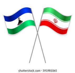 Basotho and Iranian crossed flags. Lesotho combined with Iran isolated on white. Language learning, international business or travel concept.