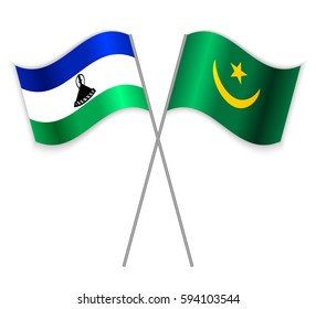 Basotho and Mauritanian crossed flags. Lesotho combined with Mauritania isolated on white. Language learning, international business or travel concept.