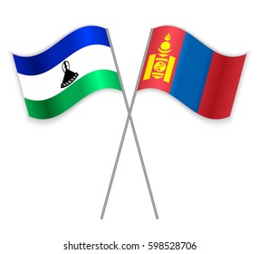 Basotho and Mongolian crossed flags. Lesotho combined with Mongolia isolated on white. Language learning, international business or travel concept.