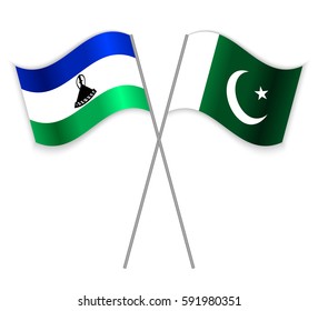 Basotho and Pakistani crossed flags. Lesotho combined with Pakistan isolated on white. Language learning, international business or travel concept.