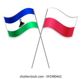 Basotho and Polish crossed flags. Lesotho combined with Poland isolated on white. Language learning, international business or travel concept.