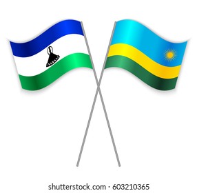 Basotho and Rwandan crossed flags. Lesotho combined with Rwanda isolated on white. Language learning, international business or travel concept.