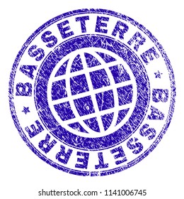BASSETERRE stamp imprint with grunge style. Blue vector rubber seal imprint of BASSETERRE label with retro texture. Seal has words placed by circle and globe symbol.