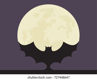 Bat against the background of the moon.