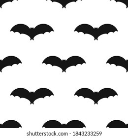 Bat icon on white background. Symbol of Halloween. Seamless pattern bats black isolated silhouette.