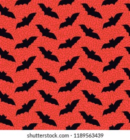 Bat pattern for Halloween on red dotted background. Can be used for poster, banner, flyer, brochure, postcards, wallpaper, textile, website background for Halloween holiday.