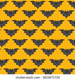 Bat pattern on the yelow background. Halloween vector pattern