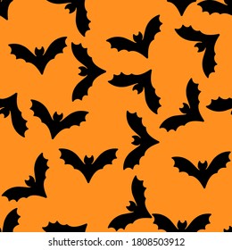 Bat Seamless Pattern. Cute cartoon black bats on the orange. Halloween, vector