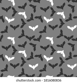 Bat Seamless Pattern. Cute cartoon black and white bats on grey . Halloween, vector