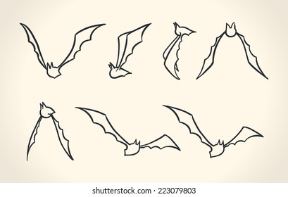 Bat silhouettes in a different poses, Halloween vector illustration over gray background