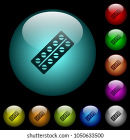 Batch of pills in blister pack icons in color illuminated spherical glass buttons on black background. Can be used to black or dark templates