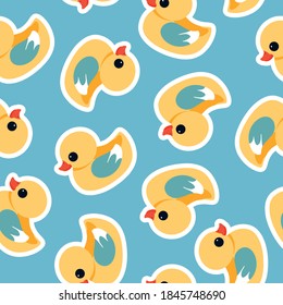 Bath duck blue and yellow pattern. Cute childish pattern design for banner, card, wallpapers, and wrapping. Trendy little yellow ducks on a blue background. The seamless pattern design.