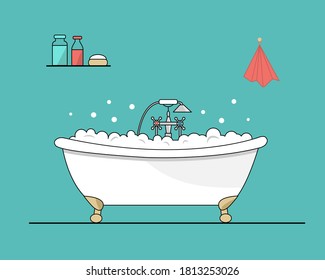 Bath filled with foam and bubbles. On the shelf are jars of shampoo and gel. The towel is hanging on the wall.