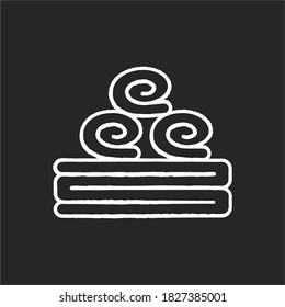 Bath towels chalk white icon on black background. Personal hygiene, bathhouse relaxation. Spa salon, bathroom and sauna accessory. Stacked clean towels isolated vector chalkboard illustration
