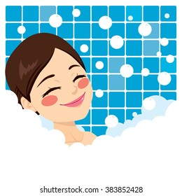 Bathing woman relaxing in bubble bath smiling with eyes closed