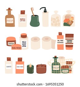 Accesorios para el cuarto de baño con muchos productos cosméticos faciales y corporales, cepillo de dientes de madera natural, frasco de perfume de vidrio, rollos de loo, cesta metálica con toallas de papel, velas aromas y otros. 