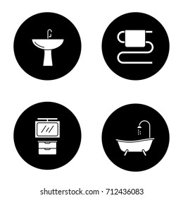Bathroom interior glyph icons set. Washbasin, bathtub, towel rail, bathroom cabinet. Vector white silhouettes illustrations in black circles