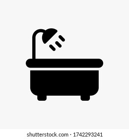 Bathtub icon designed in a solid style