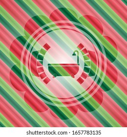 bathtub icon inside christmas colors emblem.