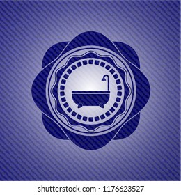 bathtub icon inside emblem with denim high quality background