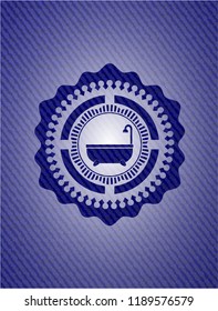 bathtub icon inside emblem with denim texture