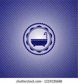 bathtub icon inside emblem with denim texture