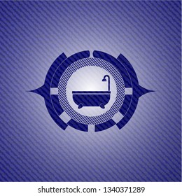 bathtub icon inside emblem with denim texture