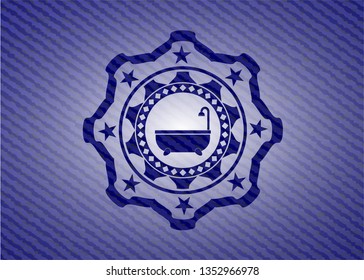 bathtub icon inside emblem with denim high quality background