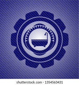 bathtub icon inside emblem with jean background